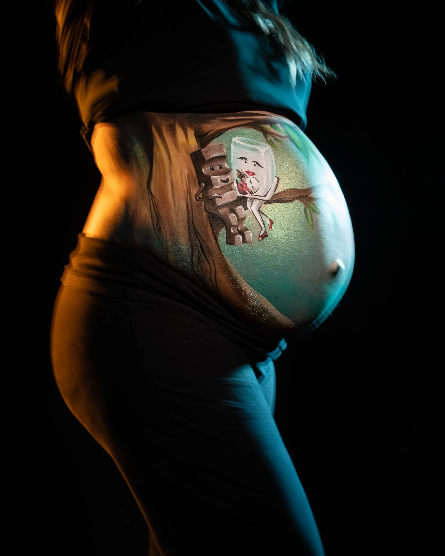Babybauch Fotoshooting in Rostock mit Bodypainting Motiv